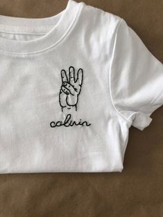 Embroidered Birthday T-shirt, Family Matching White T-shirt With Embroidered Text, White Family Matching T-shirt With Embroidered Text, White T-shirt With Embroidered Graphics As Gift, White Embroidered T-shirt For Gift, White Embroidered T-shirt For Birthday, White Embroidered T-shirt As Gift, White Embroidered T-shirt For Family Matching, Birthday Crew Neck T-shirt With Embroidered Text