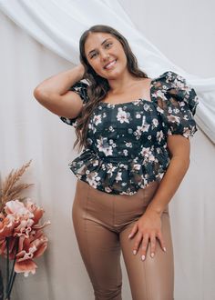 The Chloe Bustier Floral Top from BuddyLove is both flirty and fun with its back tie, puff sleeves, and feminine floral print. Get ready to turn heads! Payton is 5'4" wearing a size medium Bubble Sleeve Top, Bubble Sleeve, Top Sales, Floral Top, Puff Sleeves, Puff Sleeve, Floral Tops, Chloe, Sleeve Top