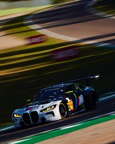 a racing car driving on a race track