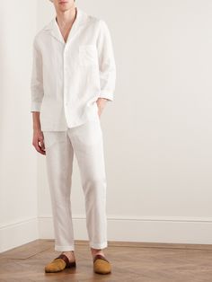 You can thank the diligent Italian artisans behind Loretta Caponi's collections for the meticulous finish of these trousers. They're expertly tailored from airy linen that's well-suited to balmy weather and cut for a relaxed, straight fit. The crisp white fabric is perfect for holidays and summer events. White Fancy Outfit Men, White Shirts For Men Designer, Cream Color Pants Outfit Men, White Man Outfit, Male Wedding Guest Outfit Summer