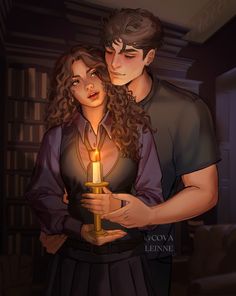 a man and woman standing next to each other in front of a book shelf holding a candle