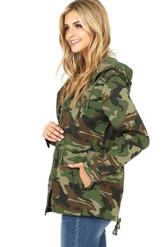 Cargo style camouflage jacket with a hoodie and zipper front. Pockets on the side with a single zipper pocket on the chest. Adjustable drawstring waist and hem. Runs small, size up one size! CARE | Hand Wash Cold CONTENTS | 100% Cotton/ Lining: 100% Polyester MEASUREMENTS | 27"/69 cm (Size Medium) MODEL | 5'8/115 lbs - wearing a size Medium IMPORTED Style Camo Jacket, Camo Jacket Women, Army Print, Camouflage Outfits, Camouflage Jacket, Short Denim Skirt, Cargo Jacket, Camo Jacket, Cargo Style