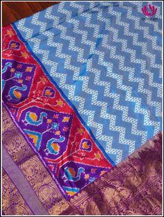 Step into this charming elegance of Kanchipuram Silk light blue saree, festooned with Ikkat pattern on its body. The blue foundation displays distinctive ikkat pattern, creating an unique and stunning look. Further it snuggled across the purple border featuring animal motif series that radiates zest for life. The vibrant purple pallu with animal motis in florals, woven in gold zari exudes perfect grandeur. The saree is accompanied by ikkat purple zari-bordered blouse, which adds opulence. Silk m Light Blue Saree, Ikkat Pattern, Blue Foundation, Purple Border, Zest For Life, Blue Saree, Kanchipuram Silk Saree, Vibrant Purple, Purple Silk