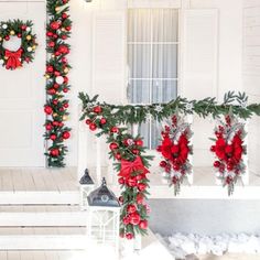 christmas decorations on the front door of a house