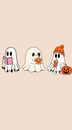 three halloween ghostes with pumpkins and one is holding a book in their hands