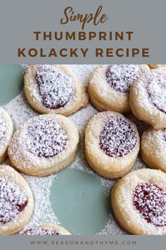 powdered sugar cookies are arranged on a plate