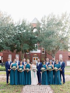 a bride and groom with their bridal party