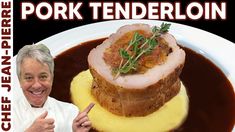 a man pointing at a plate of food with meat and sauce on it that says pork tenderloin