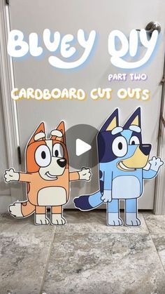 two cardboard cut outs of cartoon characters standing next to each other on a tile floor