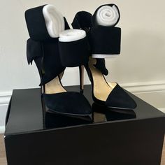 New And Never Worn, These Beauties Are A Show Stopper For The Right One Looking To Glam Up Their Outfit. Black Suede (Note: Photo Of Black Satin Is Just For Illustration Purposes). These Heels Have Never Been Worn And Come Packed To Preserve The Shoes Unique Features In Original Box. The Box Has A Slight Break In It. - 4.5" Heel Height - 1/2 Inch Hidden Platform - Cushion Insole - Pointed Toe - Satin Upper - Leather Insole - Leather Outsole - Adjustable Ankle Strap -Fits True To Us Sizing Whole Luxury Heels With Bow And Round Toe, Suede Heels With Bow For Evening, Evening Suede Heels With Bow, Luxury Black Heels With Bow, Shoes Unique, Outfit Black, Unique Features, Break In, Suede Heels