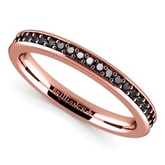 Twenty six round cut black diamonds are pave set in this rose gold and pave black diamond wedding ring. 1/4 carat total diamond weight. Proudly made in the USA. Rose Gold Rings With Black Diamonds For Anniversary, Rose Gold Black Diamond Ring, Black Diamond Wedding Ring, Rose Gold Eternity Band, Black Diamond Wedding Band, Yellow Gold Diamond Wedding Band, Champagne Ring, Black Diamond Wedding Rings, Black Diamond Wedding Bands