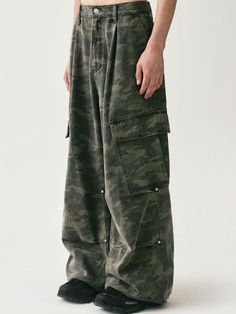 Featuring big size dimensional side pockets, these casual and stylish cargo pants have wide silhouette with front and knee tucks. They're made from high-density 7's cotton denim and are finished with high-quality sewing for durability.  - Zip and button fastening  - Two front slash pockets- Two side cargo pockets- One back flap pockets- Front tucks- Double knee tucks with rivets- Logo-engraved button and rivets- Logo leather label at back- Wide fit - Unisex wear Cargo Pants Camo, Stylish Cargo Pants, Knee Tucks, Pocket Cargo Pants, Front Tuck, Store Ideas, Leather Label, Stylish Mens Outfits, Side Pocket