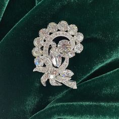 I received this fabulous vintage signed Eisenberg brooch in a lot of estate jewelry. Several of the original Swarovski prong set rhinestones were faded and yellowed. After a cleaning, the rhodium plated brooch had two of its rhinestones replaced with vintage Swarovski crystals.   The brooch measures 1.75 x 1.25".  The pin mechanism is in good working order.   This is a gorgeous statement piece which will dress up any outfit. Vintage Rhinestone Brooches For Vintage Events, Vintage Rhinestone Brooches For Evening, Vintage Evening Brooches With Rhinestones, Retro Wedding Brooches With Rhinestones, Vintage Rhinestone Brooches For Anniversary, Vintage Crystal Brooches For Anniversary, Vintage Sparkling Brooches For Party, Retro Rhinestone Brooches For Gifts, Vintage Bling Brooches For Anniversary