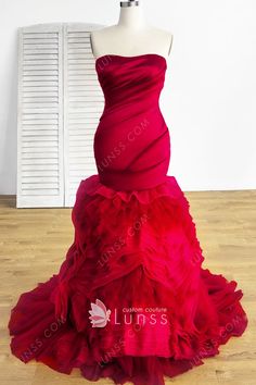 a red strapless dress with ruffled layers