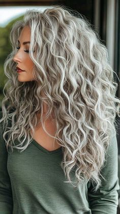 Curly Hairstyles for Women Over 50 Natural Grey Curly Hair, Long Curly Silver Hair, Big Blonde Curly Hair, Long Grey Curly Hair, Platinum Blonde Hair Curly, Long 2b Hair, Long Big Curly Hair, Ash Blonde Curls, Curly Haircut Women