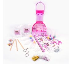 an assortment of crafting supplies are displayed on a white background with scissors and other items