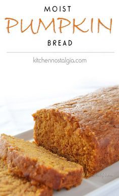 a loaf of pumpkin bread sitting on top of a white plate with the words, moist pumpkin bread