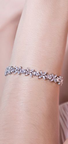 Silver Floral Crystal accents are the perfect accessory to wear for a spring wedding Gold Bracelet Wedding, Bridal Bracelets, Silver Bridal Jewellery, Eternity Bracelet, Bridal Jewellery Inspiration, Statement Bracelets, Modern Bracelets, Bridal Fashion Jewelry, Elegant Bride