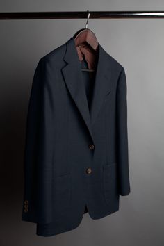 This is our best-selling and most iconic jacket. It's soft, light and can easily be dressed-up (with a shirt, tie and trousers) or dressed-down (which a sweater and jeans or chinos). It's the perfect weight to wear year-round, no matter the season or weather. It's made from a basket-woven tropical wool fabric that is designed for function, comfort and travel. The fabric is naturally flexible, stain resistant, crease resistant and realized with organic eco-friendly wool. Timeless Long Sleeve Sport Coat With Pockets, Timeless Single Button Business Casual Sport Coat, Timeless Single Button Sport Coat For Business Casual, Casual Blazer With Pressed Crease Long Sleeve, Casual Blazer With Pressed Crease And Long Sleeves, Classic Unstructured Formal Sport Coat, Classic Unstructured Notch Lapel Blazer, Classic Unstructured Business Blazer, Unstructured Single Button Business Blazer