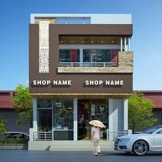 a woman with an umbrella is standing in front of a building that has a name shop name on it