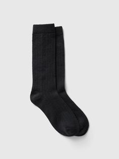 Supersoft cotton-blend crew socks.  Ribbed top.  Reinforced toe and heel.  Certain styles have allover prints.  This product was made in a factory that runs the Gap Inc.  P. A. C. E.  Personal Advancement & Career Enhancement) program.  P. A. C. E.  is our educational program that helps the women who make our clothes build the skills, knowledge, confidence & resilience needed to advance in work & life.  Learn more here.  For more fit and sizing info, check out our Size Guide. Classic Cotton Socks For Winter, Black Cotton Socks For Fall, Classic Black Socks For Fall, Classic Mid-calf Cotton Socks, Ribbed Top, Everyday Luxuries, Work Life, The Gap, Crew Socks