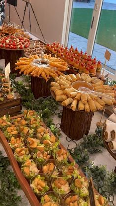 a table filled with lots of different types of food