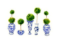 four blue and white vases with small trees in the middle one has green leaves on it