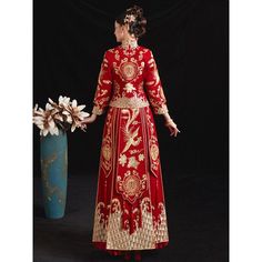 ⭐⭐ Free Shipment to Worldwide! Attention: Two options: Basic design without diamonds/ Upgrated design with Diamonds; Upgrated design: Embedded with Diamond throught whole dress pattern; 1. This Red Xiuhe Bridal Dress is Stunning and Perfect for bridals who wants to have a traditional Chinese Wedding; Made for occasions as : Chinese Traditional Wedding; 中国新娘敬酒服( Chinese bridal/ wedding toast suit ); wedding evening dress; 2. Golder Embroidery design Pattern: Phoenix, Chinese 囍 Character... Two la Traditional Wedding Dress With Gold Embroidery, Embroidered Floor-length Wedding Dress For Traditional Ceremonies, Traditional Fitted Dress For Marriage, Traditional Red Wedding Dress For Festive Season, Ceremonial Dresses With Floral Embroidery, Ceremonial Floor-length Embroidered Dresses, Floor-length Embroidered Dresses For Ceremonial Occasions, Floor-length Marriage Sets With Intricate Embroidery, Intricate Embroidery Marriage Sets Floor-length