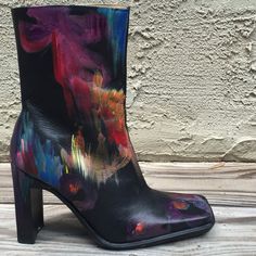 Stunning high fashion boots with a fun pop art style! The design is very colorful and painted in an abstract style. The colors vary from blue, red, purple and yellow to create an unique and attention grabbing look. The woman who wears these boots will definitely start her own fashion trend. The boots are black leather with high fashion block heels. Size 6.5. Bold Platform Boots For Party, Bold High-top Boots For Fall, Bold Ankle Boots With Reinforced Heel, Painted Boots Diy Ideas, Chic Multicolor Leather Boots, Multicolor High Ankle Party Boots, Multicolor Leather High Ankle Boots, Multicolor High-top Party Boots, Crazy Boots