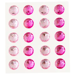 many different types of pink stones on a white background