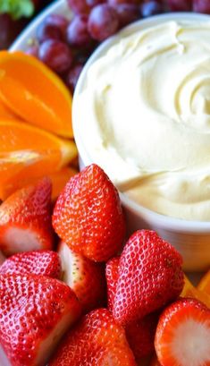 fruit and dip are arranged on a plate