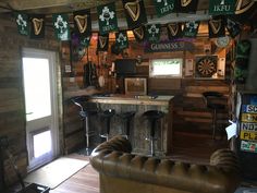 the bar is decorated with irish flags and banners