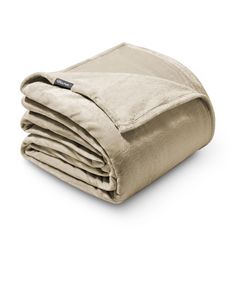 an image of a blanket folded on top of each other with the cover pulled down