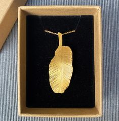 "Gold banana plant leaf necklace with a delicate chain. The pendant measures 1\"x 2\" (2,5 x 5 cm) It's available in 3 styles - Gold plated brass pendant, on 16\" or 18\" gold plated chain - Gold vermeil sterling silver pendant, on 16\" or 18\" gold vermeil chain - Solid sterling silver pendant, on 16\", 18\" or 20\" sterling silver chain GOLD PLATED Gold plated jewelry is usually made from a cheaper base metal like copper, nickel, brass, or a combination of alloys. The base metal is coated with Gold Plated Leaf-shaped Jewelry For Gifts, Banana Plant, Stay Gold, Gold Charm Necklace, Delicate Chain, Banana Leaf, Chain Gold, Pendant Gold, Leaf Necklace