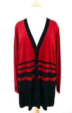 Exclusively Misook red & black v-neck cardigan sweater. Faux pockets. 6 1/4" slits at side seams. 100% acrylic. Very good condition. Size Medium. Garment measurements-- bust: 48" shoulder width: 15 3/4" sleeve length measured from top of sleeves: 24 1/4" hips: 50" front length from top of shoulder at neckline, measured straight down: 29 1/2" Casual Striped V-neck Cardigan, Striped Long Sleeve Cardigan For Layering, Striped V-neck Cardigan For Winter, Striped V-neck Sweater For Fall, Striped V-neck Cardigan For Spring, Striped V-neck Winter Sweater, Striped V-neck Sweater For Winter, Winter Striped Cardigan, Winter Striped V-neck Sweater With Long Sleeves