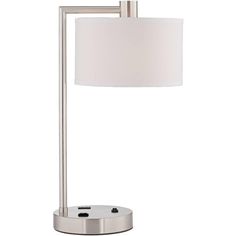 a table lamp with a white shade on it and a silver metal frame around the base