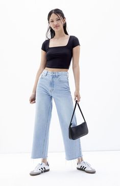 The Light Indigo Cropped Wide Leg Jeans from PacSun is a new classic you're gonna wanna cop now. These classic high-rise jeans get updated with a wide-leg fit for added comfort, a raw-cut hem, and a cropped length. Model #1 is wearing a size 26 / Model measurements: 5’8.5” height, 32” bust, 23.5” waist, 35” hipsModel #2 is wearing a size 29 / Model measurements: 5’7” height, 34” bust, 29” waist, 36” hipsLearn more about PacSun eco items PacSun Womens Light Indigo Cropped Wide Leg Jeans - Blue size 27 College Casual, Slim Fit Cargo Pants, Wardrobe Upgrade, Kids Activewear, Cropped Wide Leg Jeans, School Fits, Jeans Kids, Back To School Outfits, Slim Fit Pants