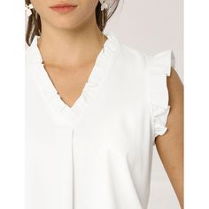 This vintage blouse is designed with a ruffled v-neck and solid color, especially for a professional look at work. The ruffle trim and sleeveless design would show demure, feminine grace and lend shape and texture. Perfectly match skinny pants or pair this blouse with high heels to make an elegant look. It is a nice choice to pair with jeans and skirts. Elegant Sleeveless Blouse With Ruffle Hem, Elegant Sleeveless Ruffle Hem Blouse, V-neck Ruffles Blouse For Work, V-neck Ruffle Blouse For Work, V-neck Ruffled Blouse For Work, Elegant V-neck Ruffle Blouse, White V-neck Blouse With Ruffles, Feminine V-neck Camisole With Ruffles, Relaxed Fit V-neck Ruffle Blouse