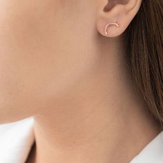 These dainty curved studs are perfect to add to your stylish jewelry collection. Create an edgy look and level up your evening outfit with our Multi Chain Cuff Earring (as shown on the last image) Metal: 925 sterling silver; optional 18k yellow / white / rose gold vermeil Earring measures: 1.2 cm / 0.47" Backing: post back, clutch backing Hypoallergenic: lead and nickel-free materials used Minimalist Rose Gold Ear Climbers For Pierced Ears, Minimalist Rose Gold Pierced Ear Climbers, Elegant Rose Gold Ear Climbers For Everyday, Modern Rose Gold Cartilage Earrings, Minimalist Crescent Cartilage Earrings, Minimalist Pierced Cartilage Earrings For Party, Minimalist Cartilage Earrings For Party, Wire Stud Earrings, Minimalist Jewelry Silver