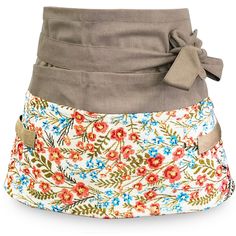 a women's multicolored floral skirt with a bow on the front and side