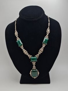 Vintage Sterling Silver 1920's Green Onyx and Marcasite Necklace Item w#2250 Clean and in good condition Acid tested for Sterling Silver 26.5 grams 15.75 inches long  Welcome to Westgate Jewels!! We specialize in vintage estate, designer, and fine jewelry. Our shop consists of items that are estate, antique, and / or vintage conditions unless otherwise noted. This means that most items are prior owned and may have some imperfections such as light scratches, scuffs, and / or patina. Our items are Art Deco Hallmarked Necklaces For Evening Wear, Art Deco Hallmarked Necklace For Evening, Vintage Hallmarked Necklaces For Evening, Antique Green Jewelry For Evening, Vintage Green Necklaces For Evening, Vintage Green Necklace For Evening, 1920s Jewelry, Vintage Native American Jewelry, Vintage Designer Jewelry