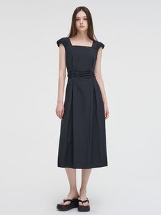 This is a trendy and feminine dress by ETMON that is made out of high quality and sturdy material. With distinctive mood of the design and modern feminine look, you can style it for your casual daily outfit.- Pin tuck and dart detail on the sleeve- Shirring detail on the waist with strap- Feminine and trendy look Chic Midi Dress With Folds For Work, Workwear Midi Dress With Folds, Chic Ruched Midi Dress For Office, Knee-length Midi Dress With Folds For Work, Spring Workwear Midi Dress With Folds, Spring Midi Dress For Work With Folds, Spring Office Midi Dress With Ruched Detail, Black Dresses With Folds For Workwear, Modern Midi Dress For Office In Summer