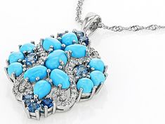 7x5mm And 6x4mm Oval Cabochon Sleeping Beauty Turquoise With 0.71ctw Round And 0.43ctw Oval London Blue Topaz And 0.40ctw Round White Zircon Rhodium Over Sterling Silver Pendant With Chain. Measures Approximately 1.56"L x 0.97"W. 2mm bail. Lobster clasp with 2"Extender.  Accent stones primarily zircon. Turquoise Diamond Pendant Jewelry, Blue Oval Cabochon Jewelry With Gemstone Accents, Blue Oval Cabochon Gemstone Jewelry, Blue Multi-stone Jewelry With Oval Cabochon, Oval Multi-stone Turquoise Jewelry, Oval Turquoise Multi-stone Jewelry, Blue Cabochon Fine Jewelry, Fine Blue Cabochon Jewelry, Turquoise Fine Jewelry With Accent Stones