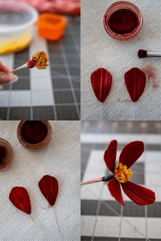 the process of making red flower petals is being performed by someone using a paintbrush