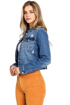 Cropped denim jacket with a classic fitted silhouette. Traditional patch pockets and button up closure down the front. CARE | Machine Wash Cold CONTENTS | 68% Cotton, 26% Polyester, 4% Rayon, 2% Spandex MEASUREMENTS | 18"/46 cm Top to Bottom (Size Small) MODEL | 5'8 - wearing a size Small MPORTED Fitted Jean Jacket, Marina Laswick, Canadian Models, 70s Inspired Fashion, Waxed Jeans, Levi Jeans Women, Classic Denim Jacket, Cropped Denim Jacket, Cool Boots