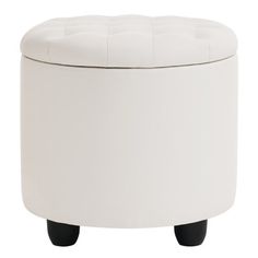 a white ottoman with black legs and a button on the top is shown in front of a white background