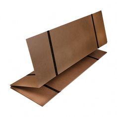 an open brown cardboard box with black lines on the bottom and sides, laying flat against a white background