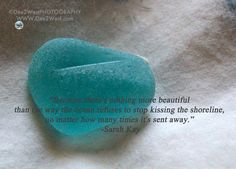 a close up of a rock with a quote written on it and an image of a heart