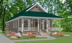 a small house in the middle of some trees and grass with flowers around its front porch