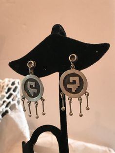 "Lovely, vintage Los Ballesteros earrings, with an early mark, Iguala, instead of Taxco, and double B. The rest of the mark is illegible. The errings are 1 5/8\" long and 7/8\" wide. They are screw back, and in excellent, vintage condition." Vintage Sterling Silver Chandelier Earrings, Vintage Sterling Silver Dangle Chandelier Earrings, Vintage Sterling Silver Chandelier Dangle Earrings, Retro Silver Pierced Jewelry, Vintage Sterling Silver Chandelier Drop Earrings, Silver Retro Jewelry With Pierced Design, Vintage Silver Round Chandelier Earrings, Vintage Hallmarked Dangle Earrings, Retro Pierced Dangle Jewelry